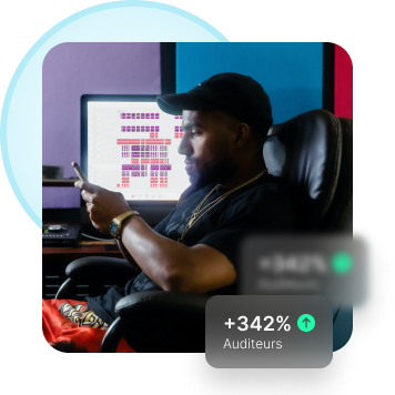 Man in a music studio with listening statistics